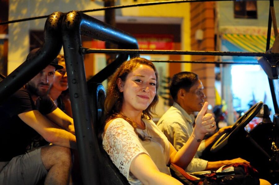 Private Jeep Tour Saigon by Night & Cruise Dinner with Music - Dinner, river views, and Vietnamese music
