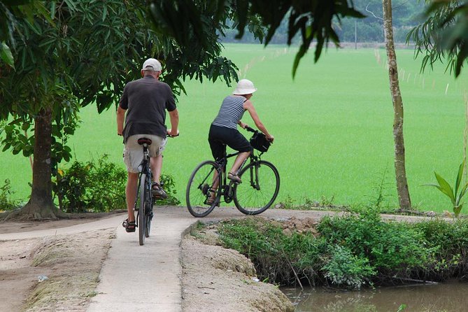 PRIVATE LUXURY Mekong 1 Day with Biking, Fishing, Cooking Class & BBQ LUNCH - Rowing through the narrow canals