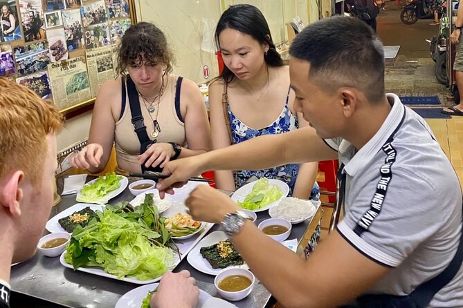 Private Saigon Ultimate Street Food & Motorbike Experience - District 5 and crab soup in a clay pot