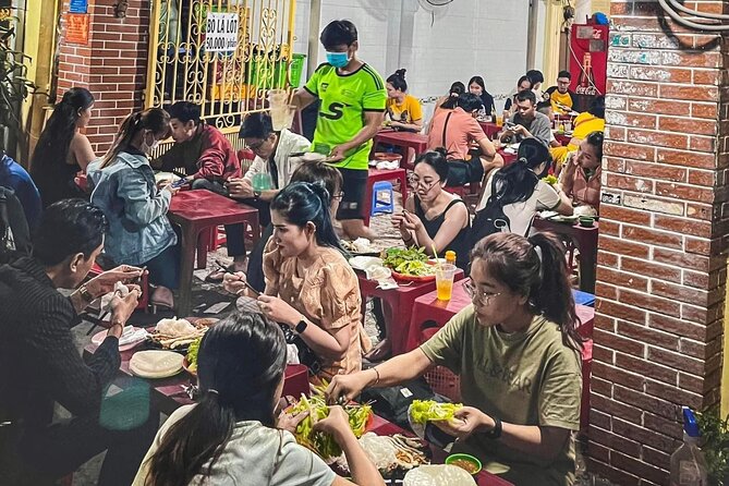 Private Street Food Tour by Motorbike/Car with Local Students - What the student guides add to the evening