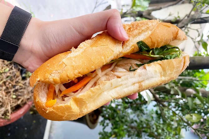 Private Street Food Tour by Scooter in Ho Chi Minh City - Nguyen Thien Thuat apartment buildings
