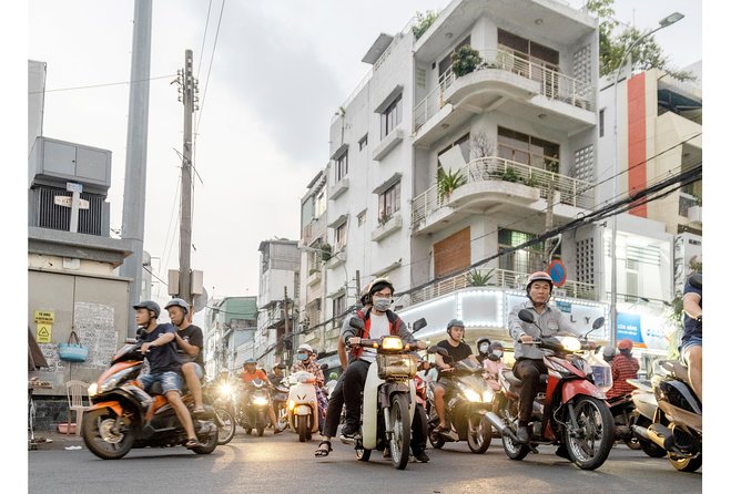 Private Street Food Tour by Scooter in Ho Chi Minh City - Ho Thi Ky Flower Market after dark