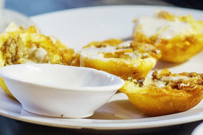 Private Street Food Tour by Scooter in Ho Chi Minh City - Eating your way through local favorites