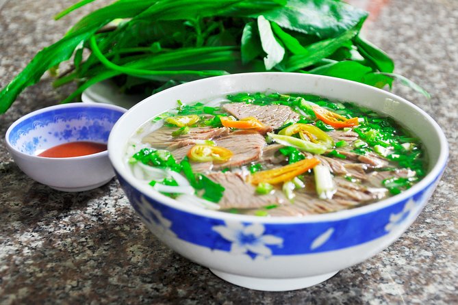 Private Street Food Tour by Scooter in Ho Chi Minh City - Thich Quang Duc Monument and the weight of the first stop