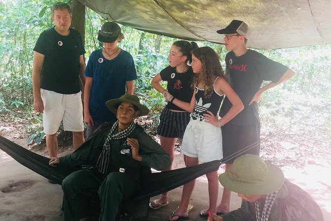 Private Tour - Cu Chi Tunnels with English Speaking Tour Guide - Walking through traps, craters, and rice fields