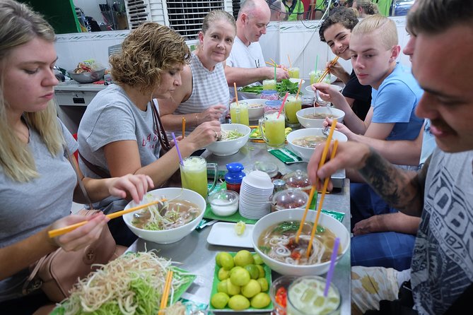 Saigon After Dark and Street Food by Motorbike and Scooter - Seeing Saigon from the back of a motorbike