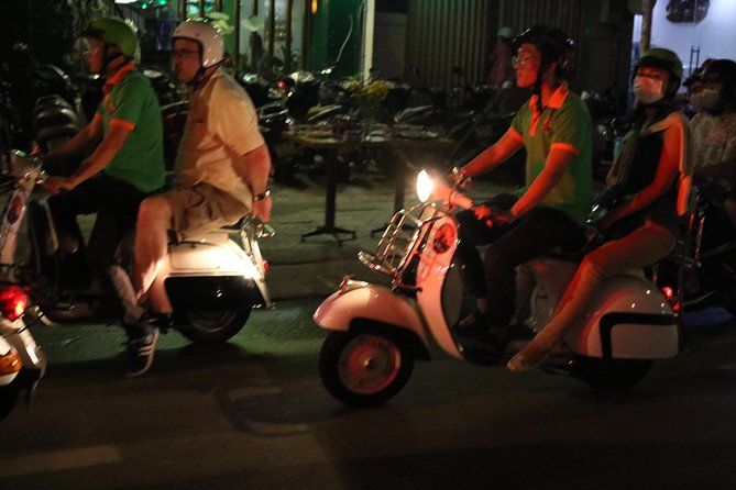Saigon After Dark Vespa Street Food Tour + Live Music 4 hours - Banana cake and stories from the street