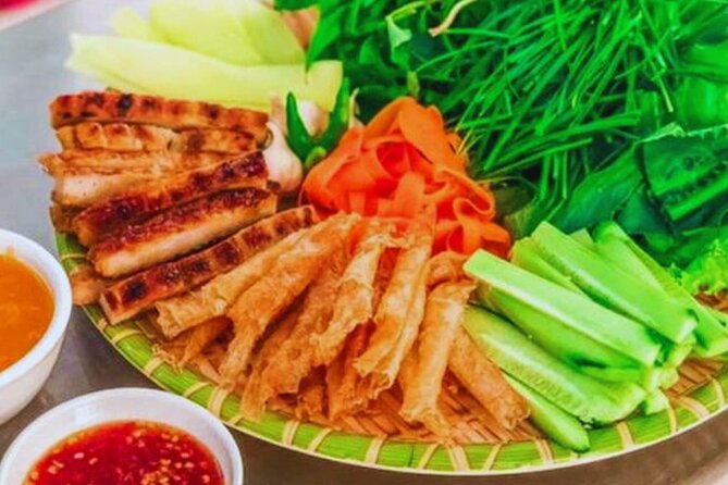 Saigon Authentic Food Walking Tour with Less Tourist People - Grilled pork sausage with herbs and noodles