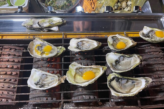 Saigon By Night and Street Food By Motorbike | Opt: Ao Dai Riders - District 4 and the final noodle dish