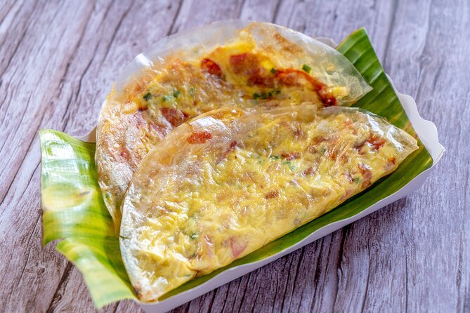 Saigon By Night and Vietnam Local Food on Motorbike - District 5 serves up banh xeo