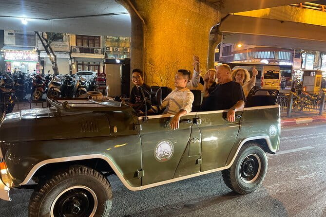 Saigon By Night Open Air Jeep Street Food Tour Experience - From District 1 lights to the real evening streets