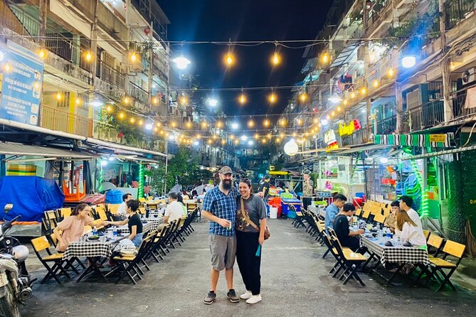 Saigon by Night: Private Street Food Walk You Can’t Miss - Vietnamese pizza, sugarcane juice, and a seafood challenge