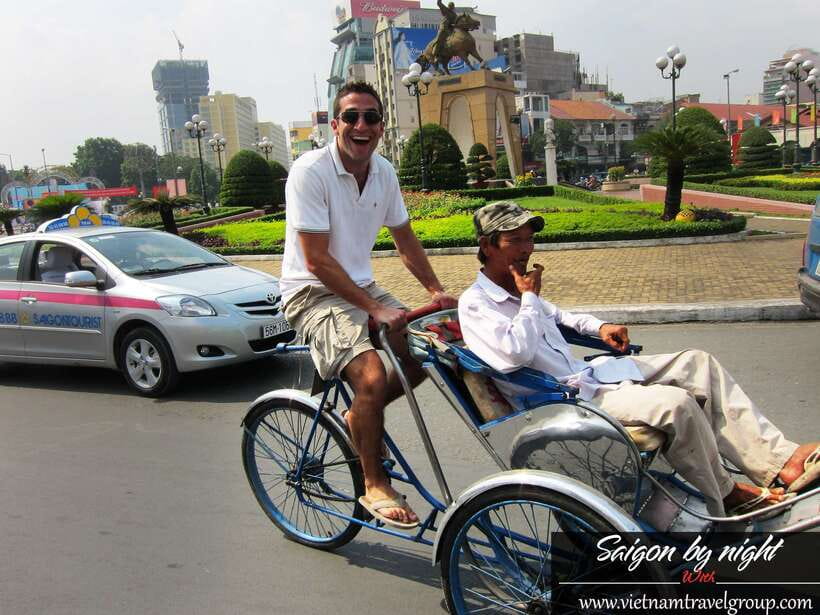 Saigon by Night: Traditional Dinner Cruise - Seeing Ben Thanh Market and City Hall by cyclo