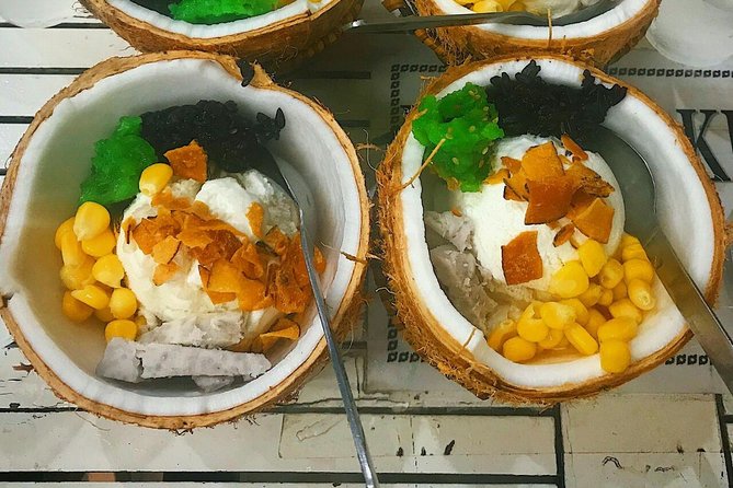 Saigon Evening Food Tour by Scooter - Walking through the wholesale flower market