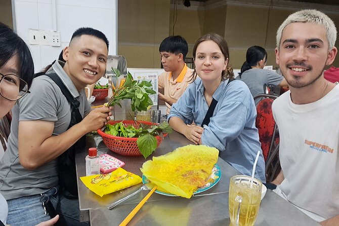 Saigon Food Tour by Scooter with Eleven Tastings - District 5 and the bánh mì stop
