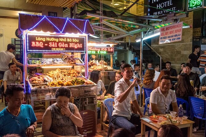 Saigon Night Bites on Foot: Local Vendors, Stories & Sweet Finish - Beer, peanuts, rice crackers, and a flan finish