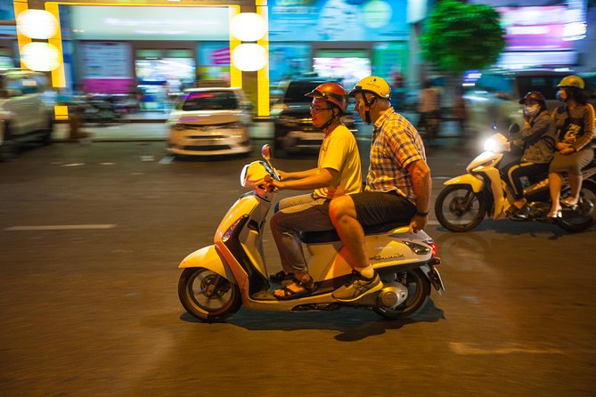 Saigon Night Street Food and City Tour on Scooter - Noodle soup in a local setting