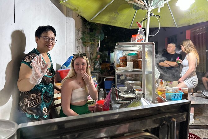Saigon Night Walking Food Tour - 100% No Tourist - Leaving central Saigon for District 7