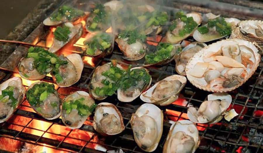 Saigon: Private Backstreets Walking Food Tour - A taxi ride and a District 10 finish