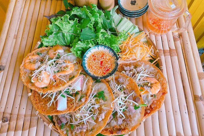 Saigon Scooter Adventure - City Sights & Street Food Tour - Riding through Ban Co Market