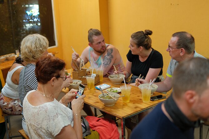 Saigon Sight & Food Tour By Night (Private Tour) - Nguyen Hue Street and Bach Dang Wharf after dark