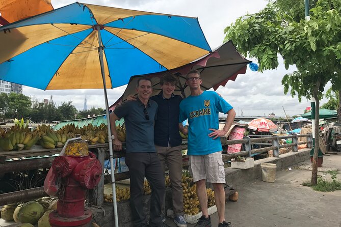 Saigon Slum tour and Saigon Chillspots by motorbike/ Aodai rider - Starting with the city beyond the center
