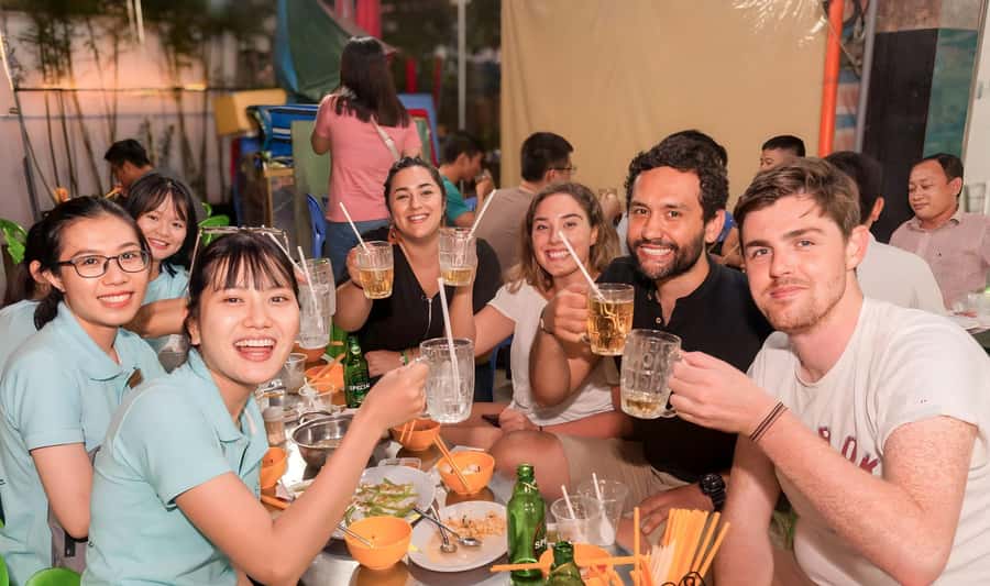 Saigon: Street Food Tasting & Sightseeing Tour by Motorbike - The first ride and Saigon’s four-district view
