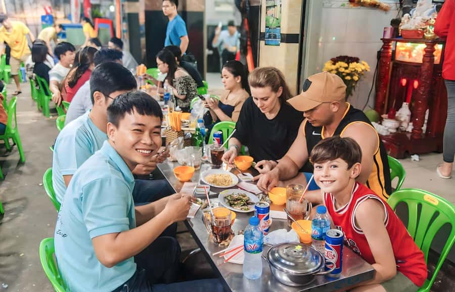 Saigon: Street Food Tasting & Sightseeing Tour by Motorbike - Stop two: grilled plantain with coconut sauce