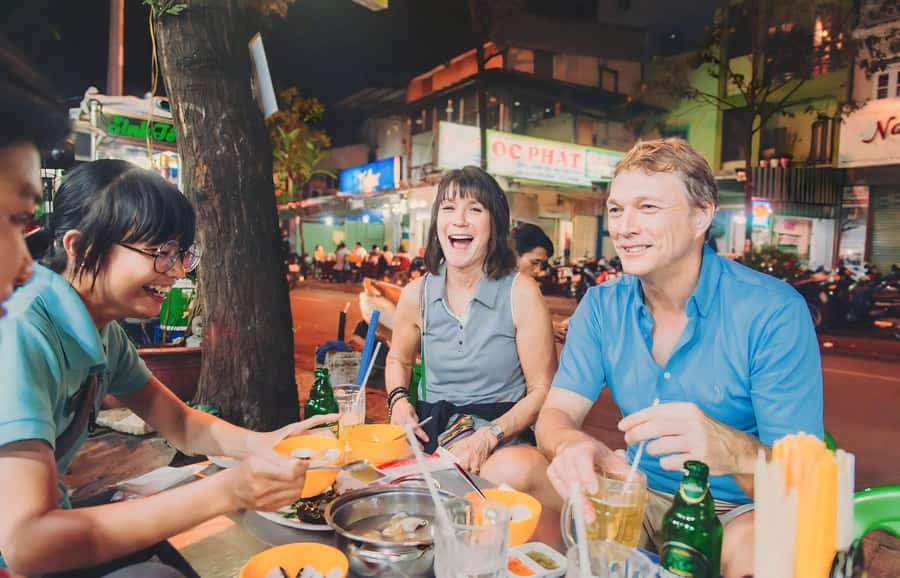Saigon: Street Food Tasting & Sightseeing Tour by Motorbike - Nguyễn Thiện Thuật and crispy bánh khọt
