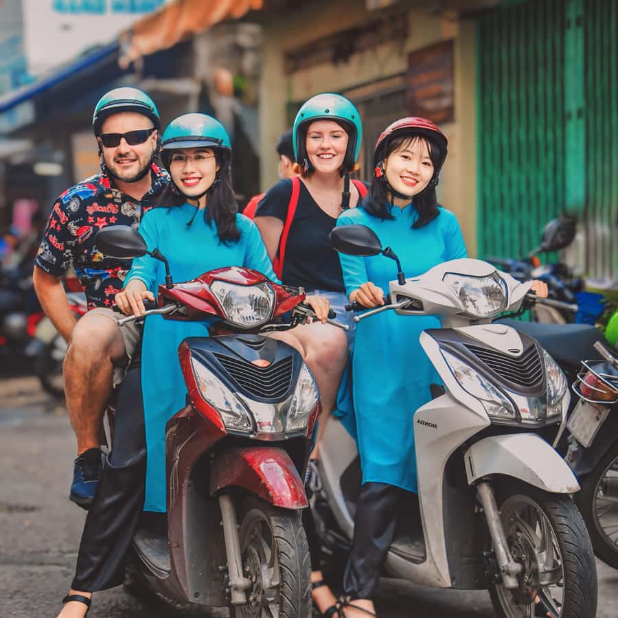 Saigon: Street Food Tasting & Sightseeing Tour by Motorbike - Meeting the riders near Nguyen Du Secondary School