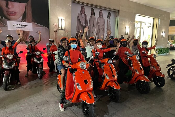 Saigon Vespa By Night Street Food With Female Riders Ao Dai - First food stop: seafood and local drinks