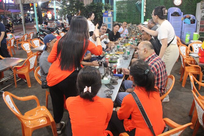 Saigon Vespa By Night Street Food With Female Riders Ao Dai - Riding through Ho Chi Minh City after dark