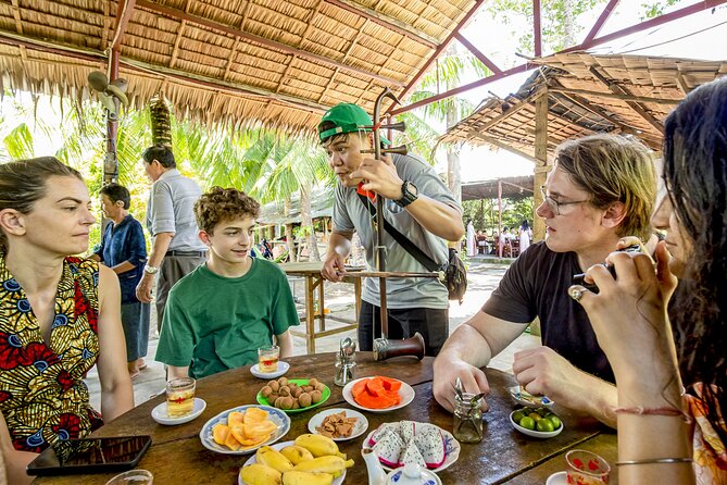 Small-Group Mekong Delta Day Trip: Boat Ride, Cottages & Pagoda - Lunch beside the water