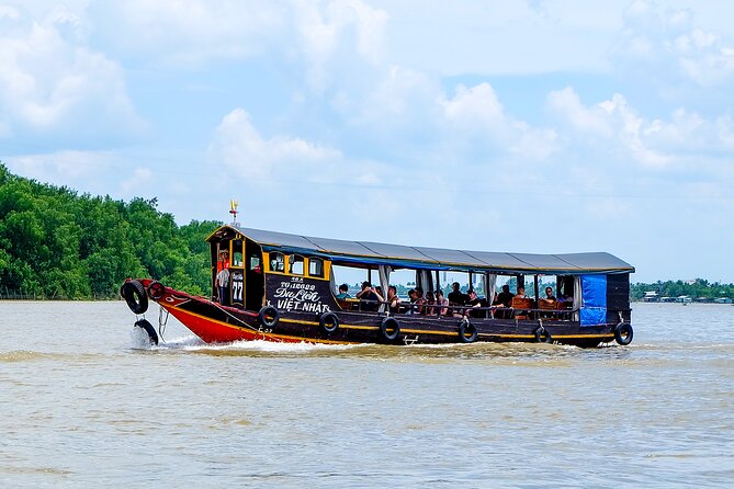 Small-Group Mekong Delta Day Trip: Boat Ride, Cottages & Pagoda - Gardens, bicycles, and narrow canals