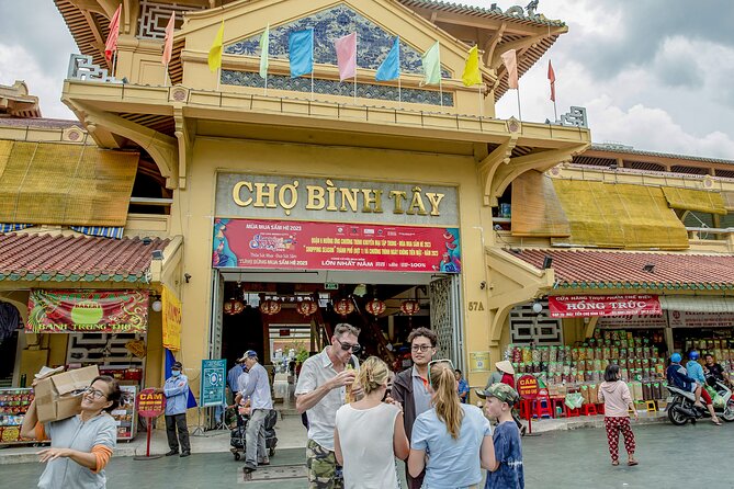 Small-group Saigon City Tour: 3-Hour Cyclo Ride to Hidden Stories - Riding toward District 5 and Saigon’s Chinese quarter