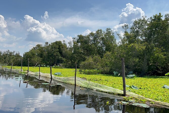Tan Lap Floating Village Authentic Mekong Delta Nature Tour - The second boat ride reaches narrower waterways