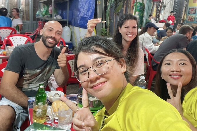 Taste of Saigon: Local Street Food Tour - Riding through Ho Chi Minh City by motorbike