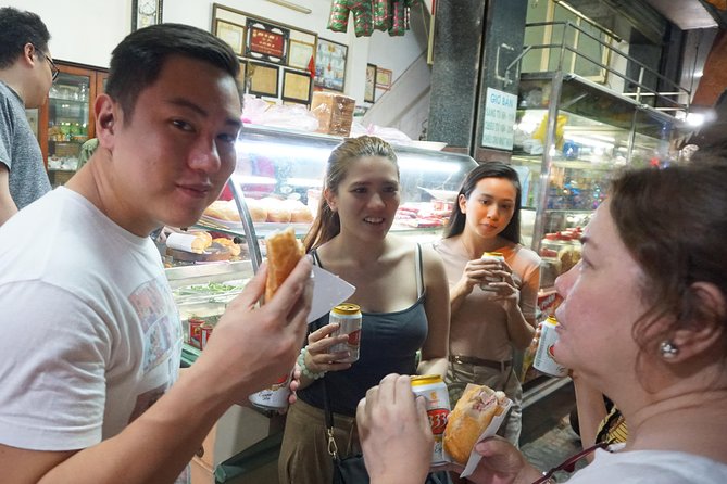 Taste the Unreal Street Food Walking Tour in Saigon - Tasting Banh Xeo, Bun Bo Hue, and More