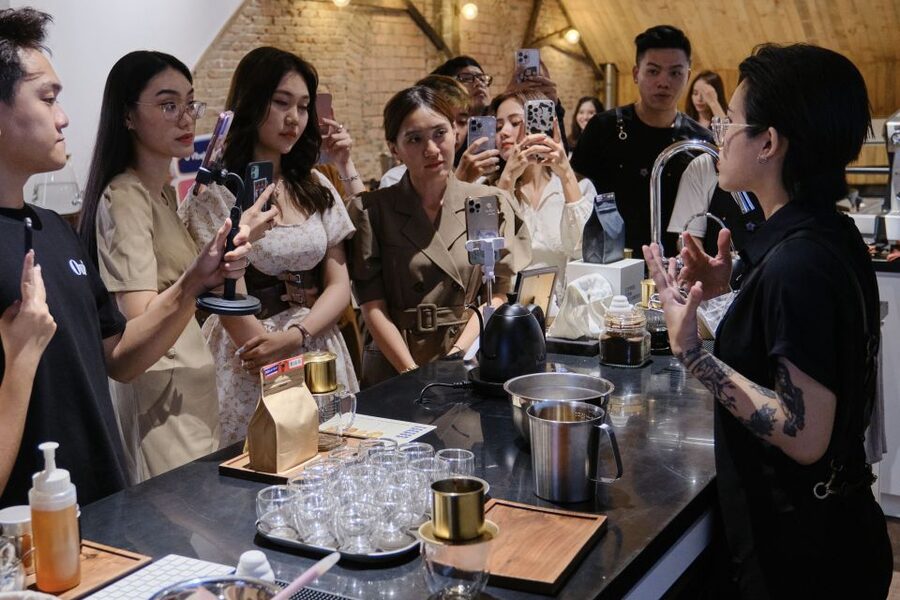 Techniques & Secrets Behind the Famed Vietnamese Egg Coffee - Tasting the finished cup with cocoa-coated cashews