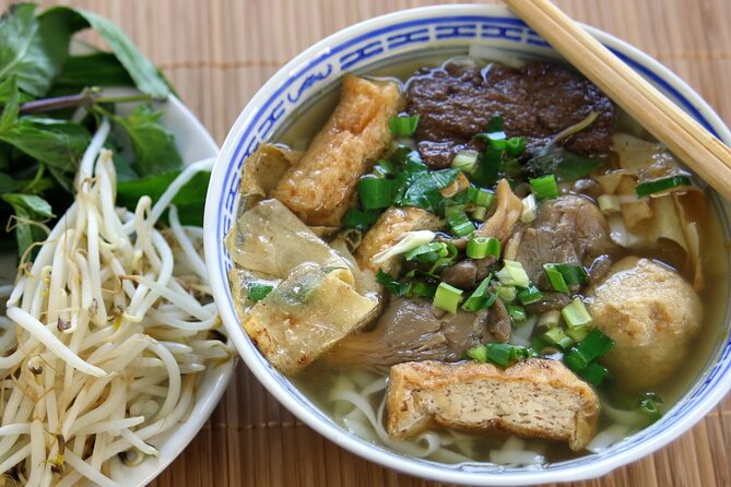 The Coolest Vegan Food Tour by Motorbike in Ho Chi Minh City - Starting with coconut drinks at Le Van Tam Park