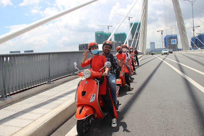 The Insider's Saigon With Female Ao Dai Riders Vespa 4,5 Hours - Pickup, timing, and the first ride