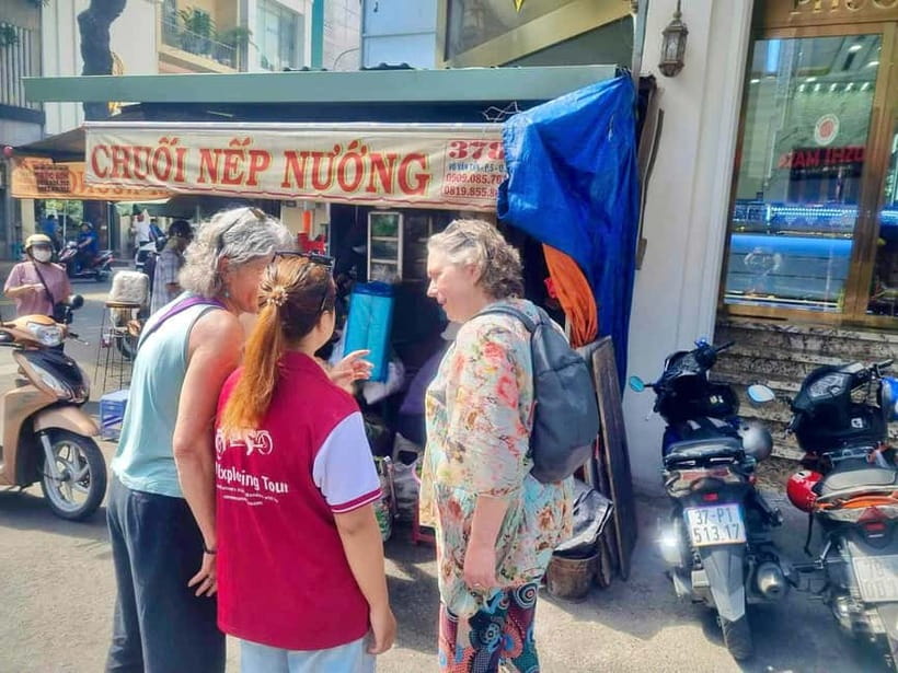 Top Saigon Unique Street Food On Scooter w/ Locals - The Final District 1 Tastings and Return Ride