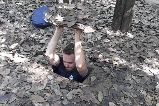 Vietnamese Cooking Class and Cu Chi Tunnels Tour from Ho Chi Minh City - Walking through the Cu Chi Tunnels