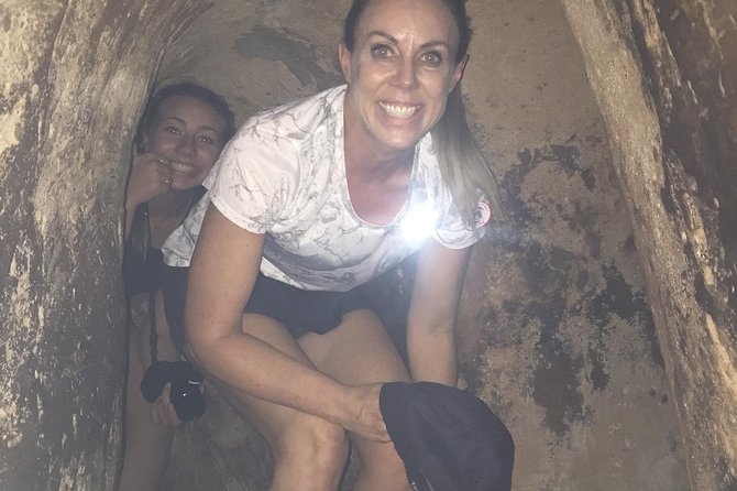VIP Tour Cuchi Tunnels & Mekong Delta Cruise Full Day Group 12pax - Entering the Cu Chi Tunnels after the morning drive